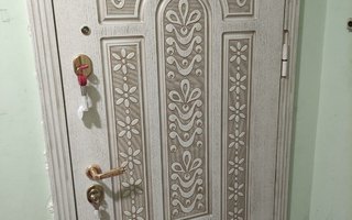 металлическая дверь ДКВ-75 в квартиру с отделкой белым МДФ с двух сторон